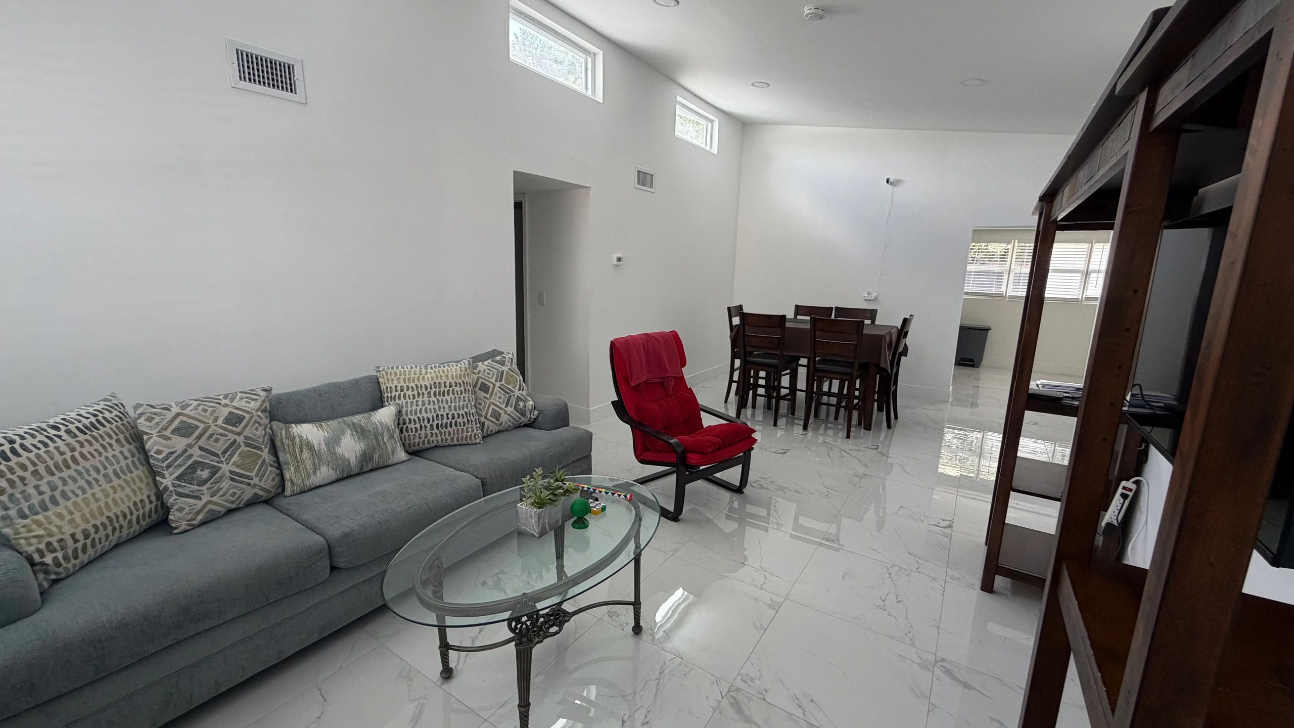 Shared living and dining room at the Miami Central and Flagami residence